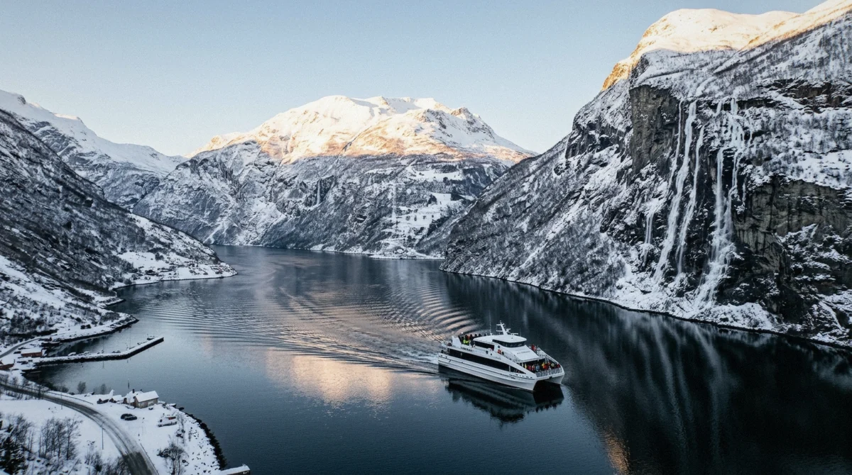 Snow-covered mountains above the Geirangerfjord in winter, the quiet season for a Geiranger fjord cruise